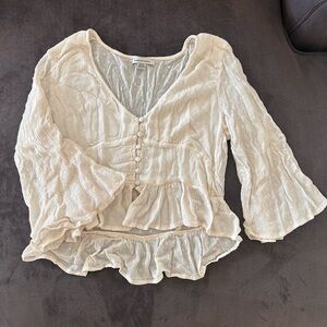 Cream peplum blouse